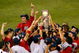 OMAHA, NE - JUNE 25:  The Fresno State Bulldogs celebrate a 6-1 win over the Georgia Bulldogs in Game 3 of the 2008 Men's College World Series Championship June 25, 2008 at Rosenblatt Stadium in Omaha, Nebraska.  (Photo by Kevin C. Cox/Getty Images)