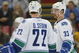 DETROIT - JANUARY 17:  The Sedin brothers Daniel #22 and Henrik #33 of the Vancouver Canucks chat prior to a faceoff in a game against the Detroit Red Wings on January 17, 2008 at the Joe Louis Arena in Detroit, Michigan. The Wings defeated the Canucks 3-2 in a shootout. (Photo by Claus Andersen/Getty Images)
