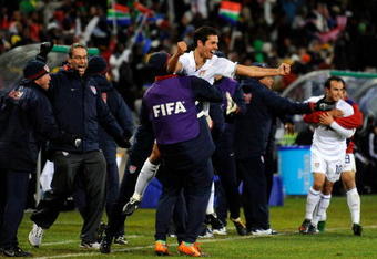 BLOEMFONTEIN, SOUTH AFRICA - JUNE 24:  Landon Donovan  #10 Benny Feilhaber#22 od USA celebrate with their bench players a goal by Clint Dempsey #8 of USA  of Spain looks on during the FIFA Confederations Cup Semi Final match between Spain and USA at the Free State stadium on June 24, 2009 in Bloemfontein, South Africa.  (Photo by Kevork Djansezian/Getty Images)