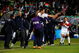 BLOEMFONTEIN, SOUTH AFRICA - JUNE 24: Landon Donovan #10 Benny Feilhaber#22 od USA celebrate with their bench players a goal by Clint Dempsey #8 of USA of Spain looks on during the FIFA Confederations Cup Semi Final match between Spain and USA at the Free State stadium on June 24, 2009 in Bloemfontein, South Africa. (Photo by Kevork Djansezian/Getty Images)