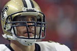 ATLANTA - NOVEMBER 9: Quarterback Drew Brees #9 of the New Orleans Saints checks the scoreboard against the Atlanta Falcons at the Georgia Dome on November 9, 2008 in Atlanta, Georgia.  (Photo by Al Messerschmidt/Getty Images) 