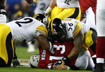 TAMPA, FL - FEBRUARY 01:  Quarterback Kurt Warner #13 of the Arizona Cardinals gets sacked by LaMarr Woodley #56 and James Harrison #92 of the Pittsburgh Steelers during Super Bowl XLIII on February 1, 2009 at Raymond James Stadium in Tampa, Florida.  (Photo by Al Bello/Getty Images)