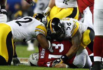 TAMPA, FL - FEBRUARY 01:  Quarterback Kurt Warner #13 of the Arizona Cardinals gets sacked by LaMarr Woodley #56 and James Harrison #92 of the Pittsburgh Steelers during Super Bowl XLIII on February 1, 2009 at Raymond James Stadium in Tampa, Florida.  (Photo by Al Bello/Getty Images)