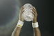 PASADENA, CA - JANUARY 04:  Quarterback Vince Young #10 of the Texas Longhorns celebrates with the National Champtionship trophy after defeating the USC Trojans 41-38 to win the BCS National Championship Rose Bowl Game on January 4, 2006 in Pasadena, California.  (Photo by Donald Miralle/Getty Images)