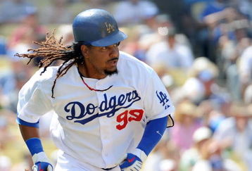 LOS ANGELES, CA - APRIL 19:  Manny Ramirez #99 of the Los Angeles Dodgers runs to first against the Colorado Rockies during the game at Dodger Stadium on April 19, 2009 in Los Angeles, California.  (Photo by Harry How/Getty Images)