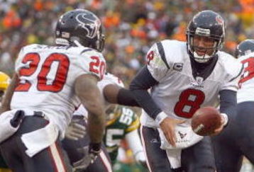 GREEN BAY - DECEMBER 7:  Quarterback Matt Schaub #8 of the Houston Texans moves to hand off the ball to Steve Slaton #20 during the game against the Green Bay Packers at Lambeau Field on December 7, 2008 in Green Bay, Wisconsin.  (Photo by: Jeff Gross/Getty Images)