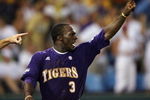 OMAHA, NE - JUNE 22:   Jared Mitchell #3 of the Louisiana State University Tigers points to teammate Mikie Mahtook after Mahtook drove in the game winning run in the 11th inning against the Texas Longhorns during Game 1 of the 2009 NCAA College World Series at Rosenblatt Stadium on June 22, 2009 in Omaha, Nebraska. The Tigers defeated the Longhorns 7-6 in 11 innings. (Photo by Elsa/Getty Images)