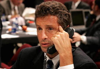 VANCOUVER, BC - JUNE 24:  General manager Doug Wilson of the San Jose Sharks talks on the phone during the 2006 NHL Draft held at General Motors Place on June 24, 2006 in Vancouver, Canada.   (Photo by Bruce Bennett/Getty Images)