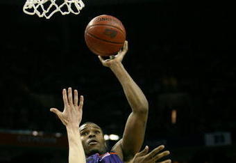 CHARLOTTE, NC - MARCH 16:  Trevor Booker #35 of the Clemson Tigers shoots over Tyler Hansbrough #50 of the North Carolina Tar Heels during the final of the 2008 Men's ACC Basketball Tournament at Bobcats Arena on March 16, 2008 in Charlotte, North Carolina. The Tar Heels defeated the Tigers 86-81 to win the ACC title.  (Photo by Kevin C. Cox/Getty Images)