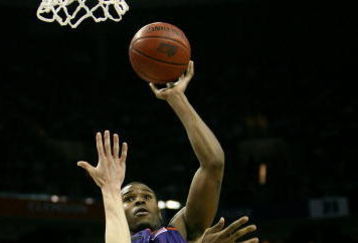 CHARLOTTE, NC - MARCH 16:  Trevor Booker #35 of the Clemson Tigers shoots over Tyler Hansbrough #50 of the North Carolina Tar Heels during the final of the 2008 Men's ACC Basketball Tournament at Bobcats Arena on March 16, 2008 in Charlotte, North Carolina. The Tar Heels defeated the Tigers 86-81 to win the ACC title.  (Photo by Kevin C. Cox/Getty Images)