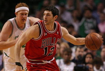 BOSTON - MAY 02:  Kirk Hinrich #12 of the Chicago Bulls heads down court as Brian Scalabrine #44 of the Boston Celtics defends in Game Seven of the Eastern Conference Quarterfinals during the 2009 NBA Playoffs at TD Banknorth Garden on May 2, 2009 in Boston, Massachusetts. The Celtics defeated the Bulls 109-99. NOTE TO USER: User expressly acknowledges and agrees that, by downloading and or using this photograph, User is consenting to the terms and conditions of the Getty Images License Agreement.  (Photo by Elsa/Getty Images)