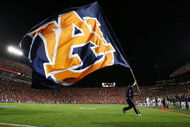 AUBURN, AL - SEPTEMBER 20:  A member of the Auburn Tigers celebrates after the offense scored against the LSU Tigers at Jordan-Hare Stadium on September 20, 2008 in Auburn, Alabama. LSU defeated Auburn 26-21.  (Photo by Doug Benc/Getty Images)