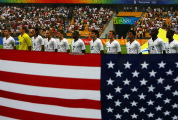 BEIJING - AUGUST 13:  The United States team lines up during their national anthem ahead of the Men's First Round Group A match between Nigeria and the United States at the Workers' Stadium on Day 5 of the Beijing 2008 Olympic Games on August 13, 2008 in Beijing, China.  (Photo by Shaun Botterill/Getty Images)