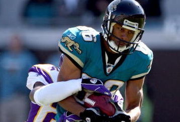 JACKSONVILLE, FL - NOVEMBER 23:  Dennis Northcutt #86 of the Jacksonville Jaguars is tackled by Tyrell Johnson #25 of the Minnesota Vikings during the game at Jacksonville Municipal stadium on November 23, 2008 in Jacksonville, Florida.  (Photo by Sam Greenwood/Getty Images)