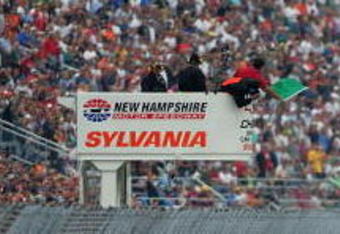 LOUDON, NH - SEPTEMBER 14:  Kyle Busch, driver of the #18 M&M's Toyota, and Carl Edwards, driver of the #99 Office Depot Ford, lead the field to the green flag during the NASCAR Sprint Cup Series Sylvania 300 at New Hampshire Motor Speedway on September 14, 2008 in Loudon, New Hampshire.  (Photo by Todd Warshaw/Getty Images for NASCAR)
