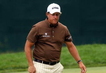 FARMINGDALE, NY - JUNE 22:  Phil Mickelson reacts to a missed putt on the 17th green during the continuation of the final round of the 109th U.S. Open on the Black Course at Bethpage State Park on June 22, 2009 in Farmingdale, New York.  (Photo by Andrew Redington/Getty Images)