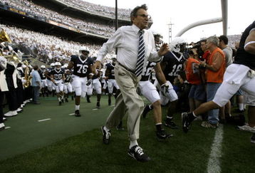 STATE COLLEGE, PA - SEPTEMBER 8:   Penn State head coach Joe Paterno runs as he leads his team onto the field before the game between University of Notre Dame Fighting Irish and Penn State Nittany Lions September 8, 2007 in State College, Pennsylvania.  (Photo by Chris Gardner/Getty Images)