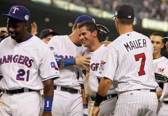 NEW YORK - JULY 15:  Micheal Young #10 is congratulated by Josh Hamilton #32 and  Joe Mauer #7 during the 79th MLB All-Star Game at Yankee Stadium on July 15, 2008 in the Bronx borough of New York City. (Photo by: Jim McIsaac/Getty Images)