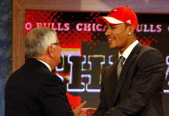NEW YORK - JUNE 26:  NBA Commissioner David Stern shakes hands with number one draft pick for the Chicago Bulls, Derrick Rose during the 2008 NBA Draft at the Wamu Theatre at Madison Square Garden June 26, 2008 in New York City. NOTE TO USER: User expressly acknowledges and agrees that, by downloading and or using this photograph, User is consenting to the terms and conditions of the Getty Images License Agreement.  (Photo by Nick Laham/Getty Images)