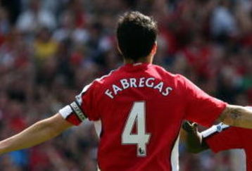 LONDON - APRIL 26:  Cesc Fabregas of Arsenal celebrates with his team mate Emmanuel Eboue after Fabregas scored the second goal during the Barclays Premier League match between Arsenal and Middlesbrough at Emirates Stadium on April 26, 2009 in London, England.  (Photo by Hamish Blair/Getty Images)