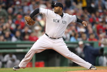 BOSTON - JUNE 11: CC Sabathia #52 of  New York Yankees throws against the Boston Red Sox at Fenway Park on June 11, 2009 in Boston, Massachusetts.  (Photo by Jim Rogash/Getty Images)