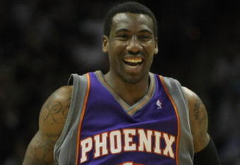 SAN ANTONIO - APRIL 29:  Amare Stoudemire #1 of the Phoenix Suns reacts to no foul called after his layup against the San Antonio Spurs during the second quarter in Game Five of the Western Conference Quarterfinals during the 2008 NBA Playoffs at the AT&T Center on April 29, 2008 in San Antonio, Texas.  NOTE TO USER: User expressly acknowledges and agrees that, by downloading and or using this photograph, User is consenting to the terms and conditions of the Getty Images License Agreement.  (Photo by Harry How/Getty Images)  