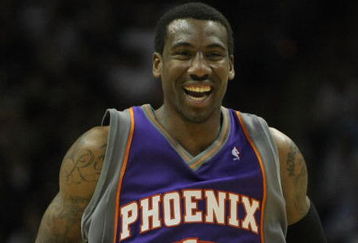 SAN ANTONIO - APRIL 29:  Amare Stoudemire #1 of the Phoenix Suns reacts to no foul called after his layup against the San Antonio Spurs during the second quarter in Game Five of the Western Conference Quarterfinals during the 2008 NBA Playoffs at the AT&T Center on April 29, 2008 in San Antonio, Texas.  NOTE TO USER: User expressly acknowledges and agrees that, by downloading and or using this photograph, User is consenting to the terms and conditions of the Getty Images License Agreement.  (Photo by Harry How/Getty Images)  