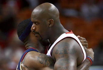 MIAMI - FEBRUARY 01:  Shaquille O'Neal #32 of the Miami Heat greets LeBron James #23 of the Cleveland Cavaliers before the game at American Airlines Arena February 1, 2007 in Miami, Florida. NOTE TO USER: User expressly acknowledges and agrees that, by downloading and or using this photograph, User is consenting to the terms and conditions of the Getty Images License Agreement.  (Photo by Doug Benc/Getty Images)