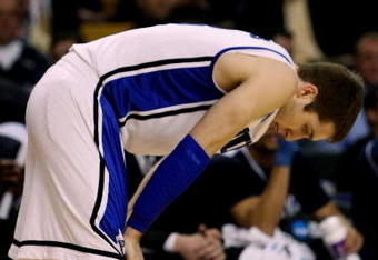 BOSTON - MARCH 26:  Greg Paulus #3 of the Duke Blue Devils reacts to committing his fourth foul against the Villanova Wildcats during the NCAA Men's Basketball Tournament East Regionals at TD Banknorth Garden on March 26, 2009 in Boston, Massachusetts.  (Photo by Elsa/Getty Images)