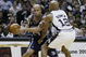 SAN ANTONIO, TX - JUNE 15: Richard Jefferson #24 of the New Jersey Nets attempts to drive around Bruce Bowen #12 of the San Antonio Spurs in game six of the 2003 NBA Finals on June 15, 2003 at the SBC Center in San Antonio, Texas. The Spurs won 88-77 and defeated the Nets to win the NBA Championship. NOTE TO USER: User expressly acknowledges and agrees that, by downloading and/or using this Photograph, User is consenting to the terms and conditions of the Getty Images License Agreement. (Photo by Ezra Shaw/Getty Images)