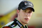 DOVER, DE - MAY 29:  Brad Keselowski, driver of the #25 GoDaddy.com Chevrolet, stands on the grid during qualifying for the NASCAR Sprint Cup Series Autism Speaks 400 at Dover International Speedway on May 29, 2009 in Dover, Delaware.  (Photo by Jeff Zelevansky/Getty Images for NASCAR)