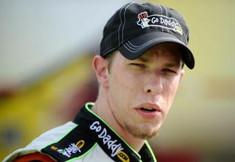 DOVER, DE - MAY 29:  Brad Keselowski, driver of the #25 GoDaddy.com Chevrolet, stands on the grid during qualifying for the NASCAR Sprint Cup Series Autism Speaks 400 at Dover International Speedway on May 29, 2009 in Dover, Delaware.  (Photo by Jeff Zelevansky/Getty Images for NASCAR)