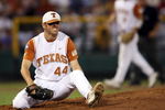 OMAHA, NE - JUNE 24:  Austin Wood #44 of the Texas Longhorns winces after getting hit by a ball against the Louisiana State University Tigers during Game 3 of the 2009 NCAA College World Series at Rosenblatt Stadium on June 24, 2009 in Omaha, Nebraska. The Tigers defeated the Longhorns 11-4 to win the national title.  (Photo by Elsa/Getty Images)