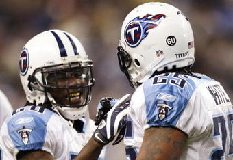 DETROIT , MI - NOVEMBER 27:  LenDale White #25 of the Tennessee Titans celebrates a second quarter touchdown with Chris Johnson #28 while playing the Detroit Lions on November 27, 2008 at Ford Field in Detroit, Michigan.  (Photo by Gregory Shamus/Getty Images)