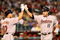 PHOENIX - JUNE 14:  Lance Berkman #17 of the Houston Astros is congratulated by teammate Ivan Rodriguez #12 after hitting a 2 run home run against  the Arizona Diamondbacks during the first inning of the major league baseball game at Chase Field on June 14, 2009 in Phoenix, Arizona.  (Photo by Christian Petersen/Getty Images)