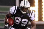 EAST RUTHERFORD, NJ - NOVEMBER 30:  Jerricho Cotchery #89 of the New York Jets runs the ball against the Denver Broncos on November 30, 2008 at Giants Stadium in East Rutherford, New Jersey.  (Photo by Jim McIsaac/Getty Images)