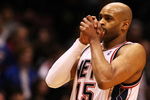 EAST RUTHERFORD, NJ - MARCH 04:  Vince Carter #15 of the New Jersey Nets reacts during the final seconds of their loss to the Boston Celtics during their game on March 4, 2009 at The Izod Center in East Rutherford, New Jersey.  NOTE TO USER: User expressly acknowledges and agrees that, by downloading and/or using this Photograph, user is consenting to the terms and conditions of the Getty Images License Agreement. (Photo by Al Bello/Getty Images)