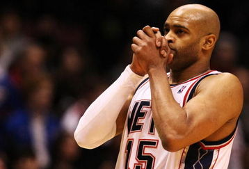 EAST RUTHERFORD, NJ - MARCH 04:  Vince Carter #15 of the New Jersey Nets reacts during the final seconds of their loss to the Boston Celtics during their game on March 4, 2009 at The Izod Center in East Rutherford, New Jersey.  NOTE TO USER: User expressly acknowledges and agrees that, by downloading and/or using this Photograph, user is consenting to the terms and conditions of the Getty Images License Agreement. (Photo by Al Bello/Getty Images)