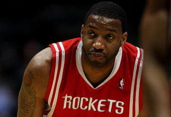 MILWAUKEE - FEBRUARY 09: Tracy McGrady #1 of the Houston Rockets watches as a teammate shoots a free-throw against the Milwaukee Bucks on February 9, 2009 at the Bradley Center in Milwaukee, Wisconsin. The Bucks defeated the Rockets 124-112. NOTE TO USER: User expressly acknowledges and agreees that, by downloading and/or using this Photograph, User is consenting to the terms and conditions of the Getty Images License Agreement. (Photo by Jonathan Daniel/Getty Images)