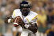 TAMPA, FL - SEPTEMBER 28: Jarrett Brown #16 of the West Virginia Mountaineers looks to pass the ball during the game against the University of South Florida Bulls at Raymond James Stadium September 28, 2007 in Tampa Florida. (Photo by Marc Serota/Getty Images)