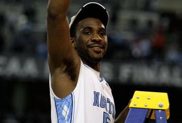 DETROIT - APRIL 06:  Ty Lawson of the North Carolina Tar Heels celebrates as he gets set to cut down a piece of the net following their 89-72 win against the Michigan State Spartans during the 2009 NCAA Division I Men's Basketball National Championship game at Ford Field on April 6, 2009 in Detroit, Michigan.  (Photo by Andy Lyons/Getty Images)
