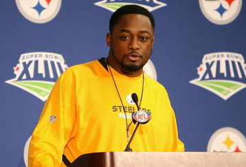 TAMPA, FL - JANUARY 29:  Head coach Mike Tomlin of the Pittsburgh Steelers speaks during a press conference after receiving the 'Motorola Coach of the Year' award at the University of South Florida on January 29, 2009 in Tampa, Florida.  (Photo by Christian Petersen/Getty Images)