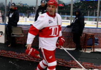 CHICAGO - JANUARY 01:  Chris Chelios #24 of the Detroit Red Wings walks off the ice after the Red Wings 6-4 win against the Chicago Blackhawks during the NHL Winter Classic at Wrigley Field on January 1, 2009 in Chicago, Illinois.  (Photo by Jonathan Daniel/Getty Images)