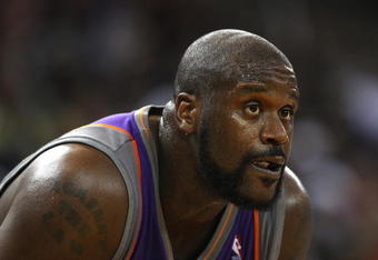 OAKLAND, CA - MARCH 15:  Shaquille O'Neal #32 of the Phoenix Suns looks on against the Golden State Warriors during an NBA game on March 15, 2009 at Oracle Arena in Oakland, California. NOTE TO USER: User expressly acknowledges and agrees that, by downloading and or using this photograph, User is consenting to the terms and conditions of the Getty Images License Agreement.  (Photo by Jed Jacobsohn/Getty Images)