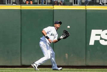 SEATTLE  - MAY 24: Franklin Gutierrez #21 of the Seattle Mariners moves to catch the flyball during the game against the San Francisco Giants on May 24, 2009 at Safeco Field in Seattle, Washington. (Photo by Otto Greule Jr/Getty Images)  