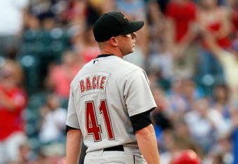 ARLINGTON, TX - JUNE 18:  Pitcher Brandon Backe #41 of the Houston Astros reacts after giving up a solo home run against Chris Davis #19 of the Texas Rangers in the second inning on June 18, 2009 at Rangers Ballpark in Arlington, Texas.  (Photo by Ronald Martinez/Getty Images)