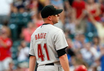 ARLINGTON, TX - JUNE 18:  Pitcher Brandon Backe #41 of the Houston Astros reacts after giving up a solo home run against Chris Davis #19 of the Texas Rangers in the second inning on June 18, 2009 at Rangers Ballpark in Arlington, Texas.  (Photo by Ronald Martinez/Getty Images)