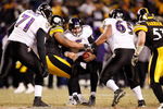 PITTSBURGH - JANUARY 18:  Quarterback Joe Flacco #5 of the Baltimore Ravens is stopped by the Pittsburgh Steelers defense during the AFC championship game on January 18, 2009 at Heinz Field in Pittsburgh, Pennsylvania.  (Photo by Gregory Shamus/Getty Images)