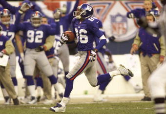 7 Jan 2001:  Ron Dixon #86 of the New York Giants returns the opening kickoff for a touchdown against the Philadelphia Eagles during the NFC Divisional playoff game at Giants Stadium in East Rutherford, New Jersey. <Digital File>  Mandatory Credit: Al Bello/ALLSPORT