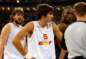 BEIJING - AUGUST 24:  Kobe Bryant #10 of the United States speaks to an official as Ricky Rubio #6 and Marc Gasol #13 of Spain look on in the gold medal game during Day 16 of the Beijing 2008 Olympic Games at the Beijing Olympic Basketball Gymnasium on August 24, 2008 in Beijing, China.  (Photo by Streeter Lecka/Getty Images)